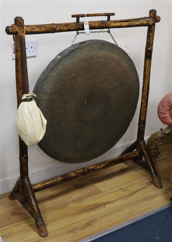 A 19th century Burmese hammered brass gong W.96cm